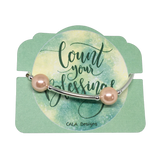 The Blessing Bracelet by CALA Designs - Handmade  - 12mm Peach Pearl - Silver Plate Spacers